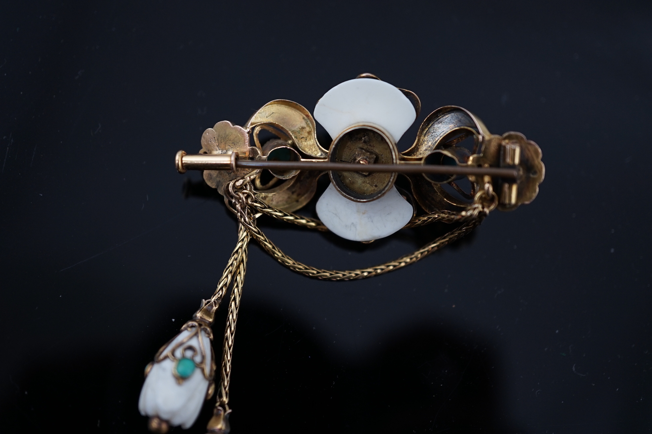 A Victorian engraved gold, white coral and turquoise cluster set tassel drop brooch